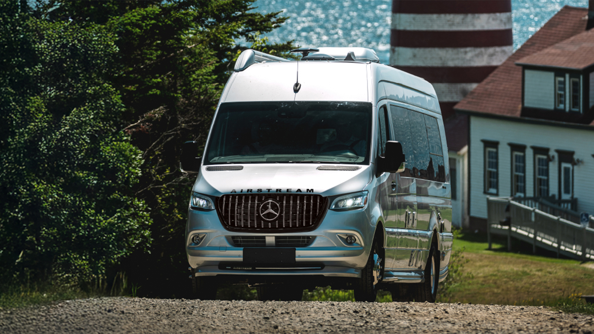 Airstream Interstate touring coach traveling on a scenic road